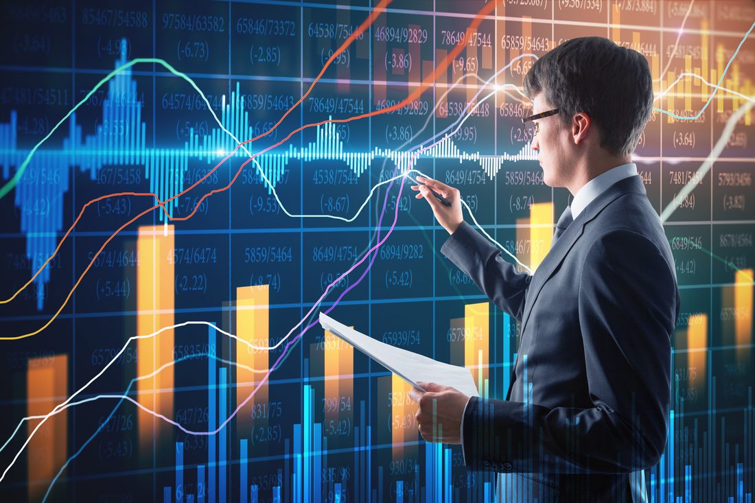 Analyst studying currency charts